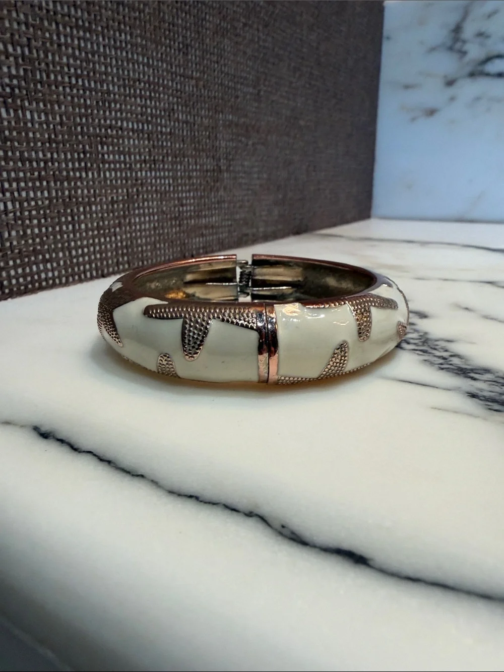 White enamel Bangle Bracelet with Textured gold tone Starfish Accents